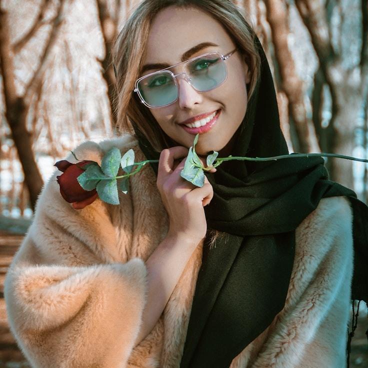 Kaveri Mehta, Lead Design Curator at ClearAtlasPivot, reviewing corporate floral arrangements